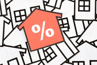Percentage and houses shutterstock_62178853