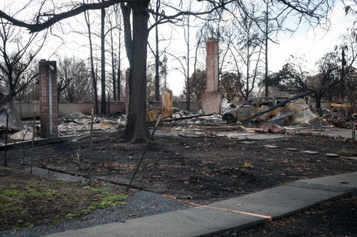 Fires and floods are eviscerating US communities, intensifying the housing crisis