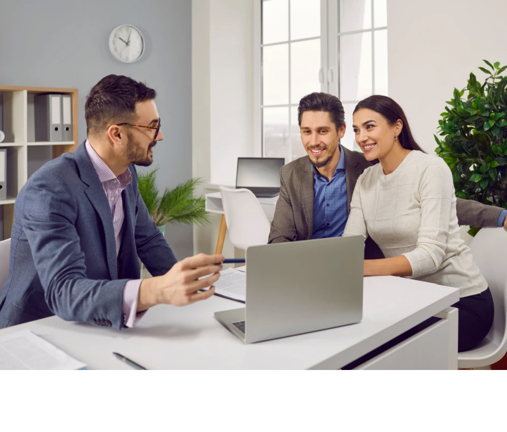 Looking at apartment on computer Shutterstock_2326671849