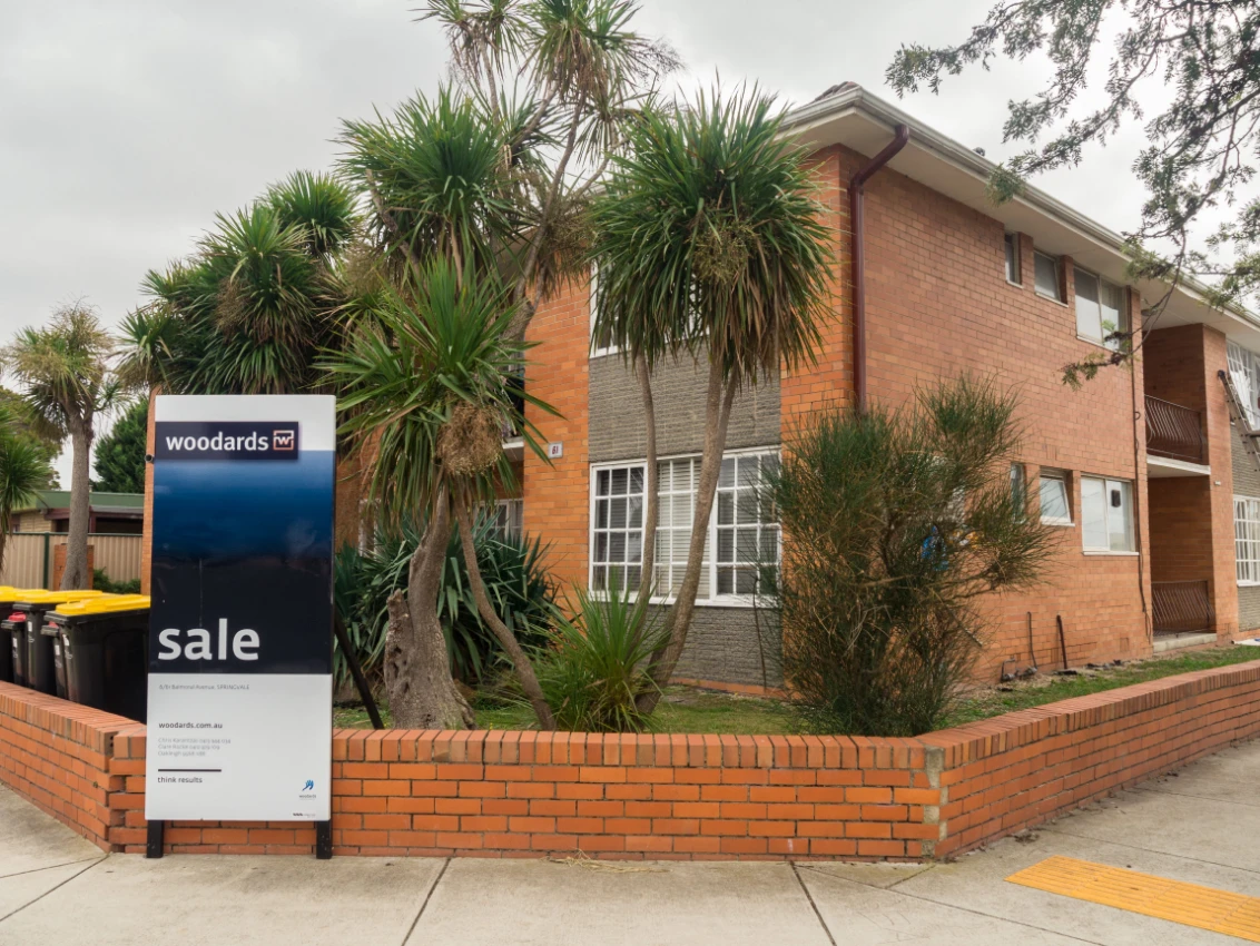 Apartment building for sale Shutterstock_400907557