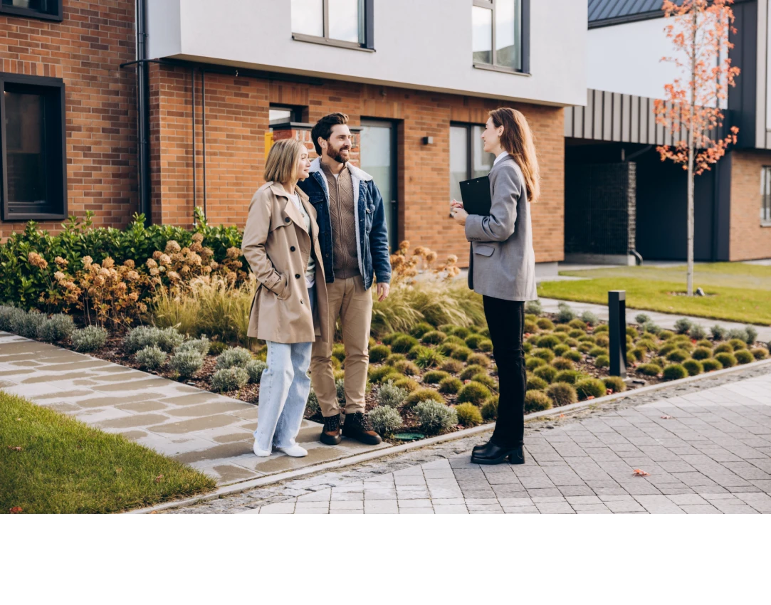 Looking at apartment bldg Shutterstock_2711950079