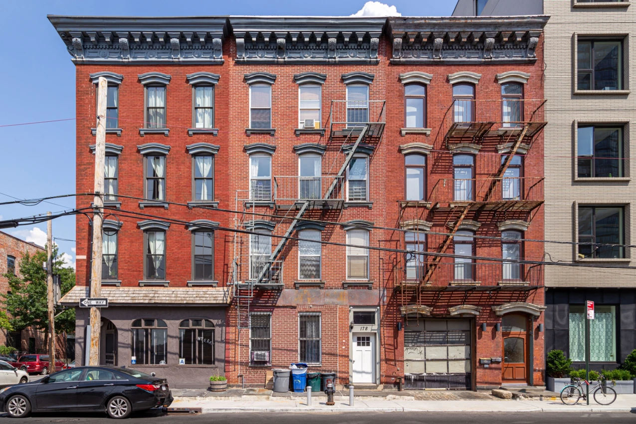 NYC apartment building Shutterstock_2314201295