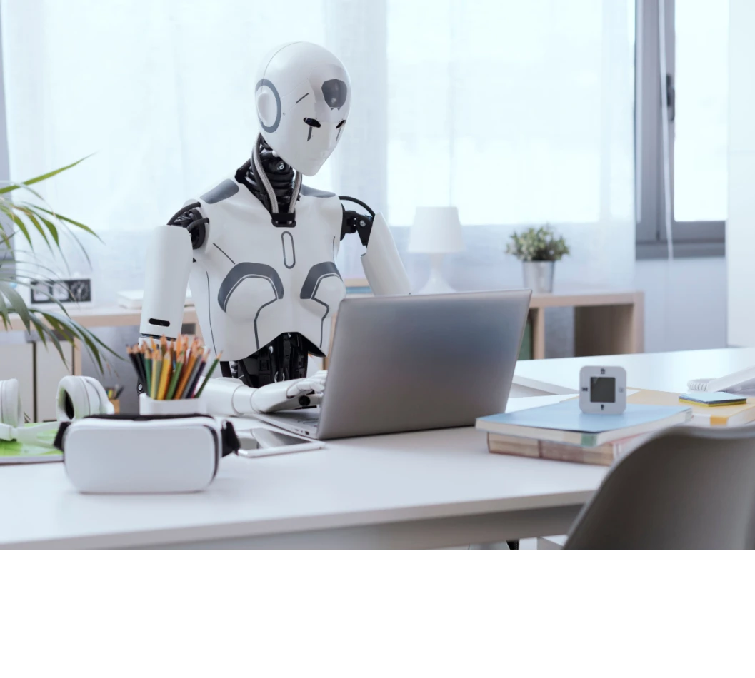 AI robot at desk Shutterstock_2271198779