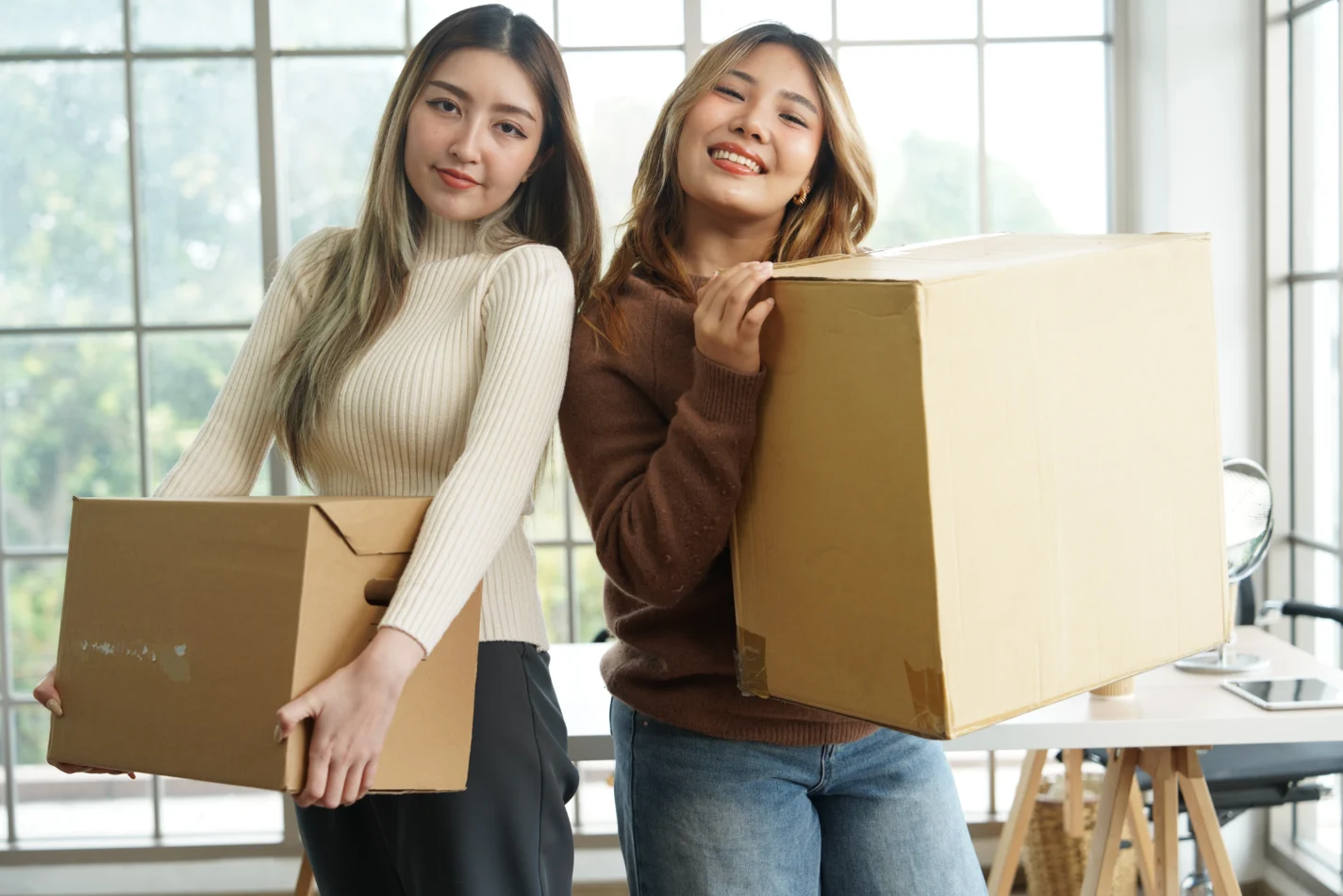 Happy renters moving in shutterstock_2435715655