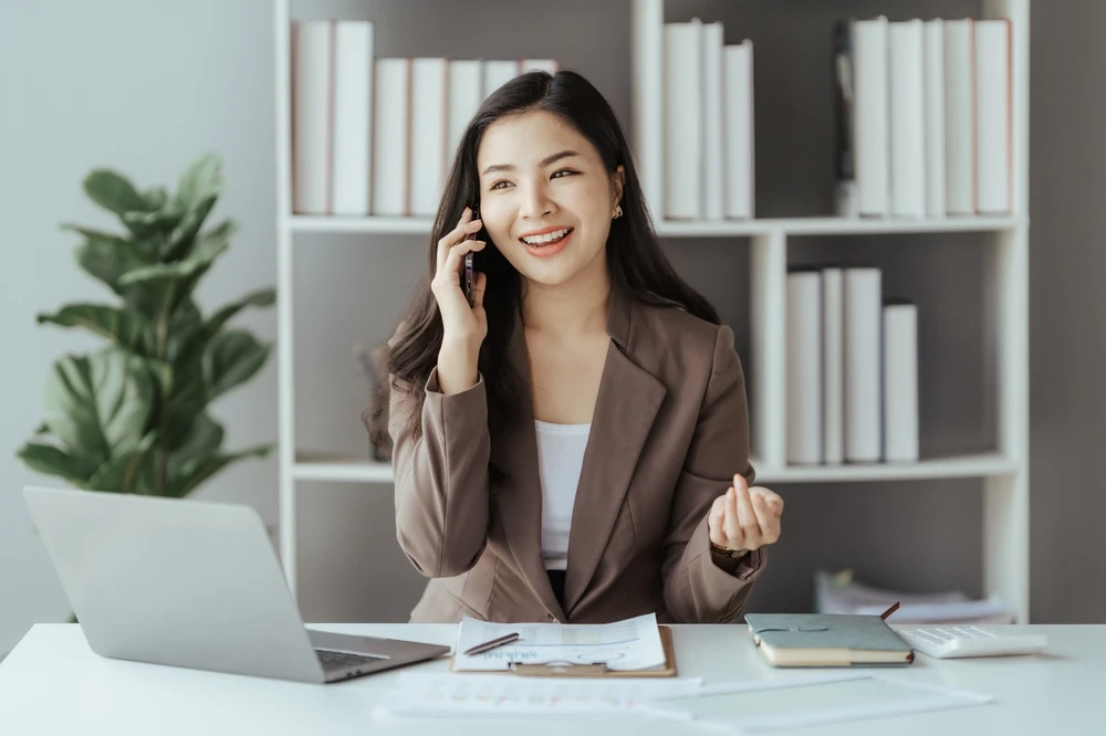Answering phone shutterstock_2272787293